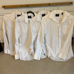 Four Nordstrom Non-Iron white dress shirt! Always on back order at Nordstrom!